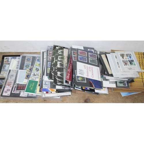 323 - A quantity of British Post Office mint stamp packs, collectors packs, mini sheets etc. approx. 95.