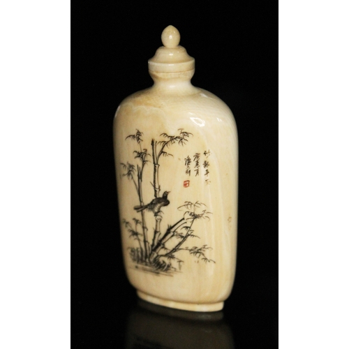 332 - A Chinese ivory snuff bottle, one side carved in relief with two figures, the other decorated with a... 