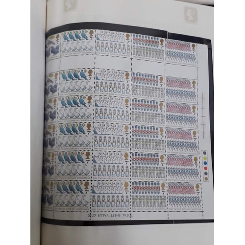 317 - GB mint stamp collection, comprising seven Stanley Gibbons Tower stamp albums, Victoria to Elizabeth... 