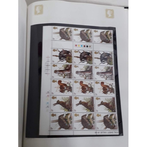 317 - GB mint stamp collection, comprising seven Stanley Gibbons Tower stamp albums, Victoria to Elizabeth... 