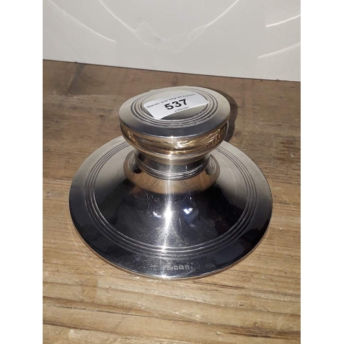 263 - A hallmarked silver capstan inkwell, sponsor's initials 'B&M', Birmingham 1923, diam. 15cm.