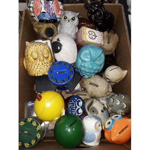 73 - A box of assorted owl money boxes.