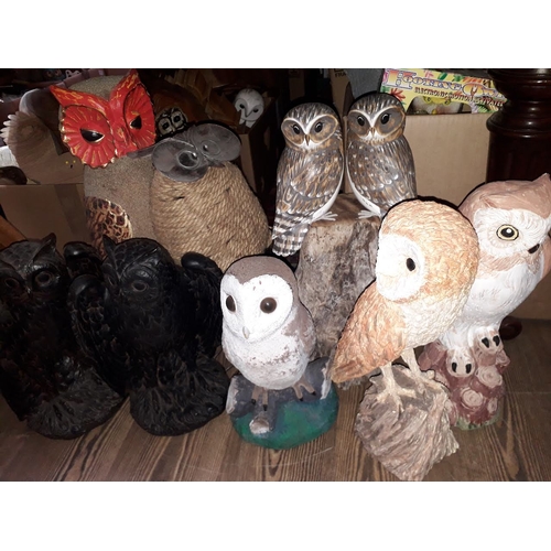 79 - A small collection of assorted owl statues.