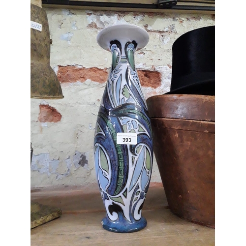 393 - A large Doulton Lambeth Art vase, chip to base, height 39.5cm.