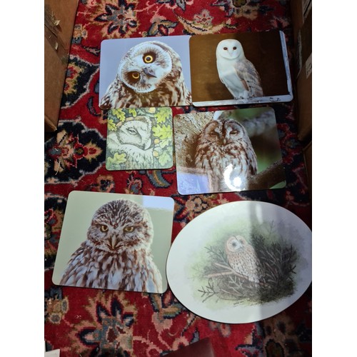 85 - A box of assorted owl coasters, placemats and tiles etc.