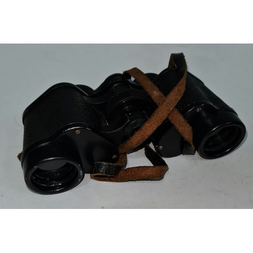 175 - A box containing three pairs of binoculars with leather cases and a Koura camera by Kowa Company Ltd... 