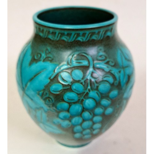 403 - A Pilkington Royal Lancastrian by W.S. Mycock. Blue green vase decorated with grapes and vine leaves... 