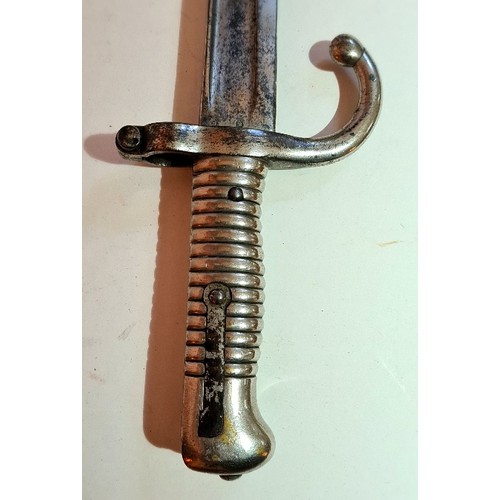 214 - A French Chassepot bayonet, dated 1863 - length of blade 57cm.