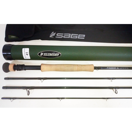 A Sage X 10'0 four piece fly fishing rod, model X 8100-4, #8 weight, 3  7/9oz with bag and rod tube.