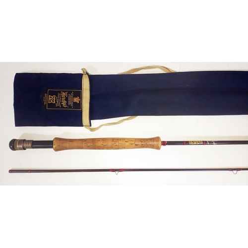 A vintage Hardy Graphite De Luxe 9 1/2' two piece fly fishing rod, #6/7  weight, with rod bag.