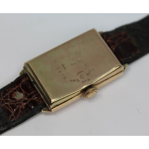 100 - An Art Deco 9ct gold Baume & Co tank style wristwatch,  ref. 761419, silvered dial with Arabic numer... 