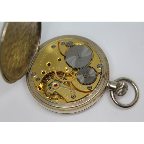 108 - An open face Omega pocket watch, circa 1943, ref. 9929197, 15 jewel movement, white enamel dial with... 