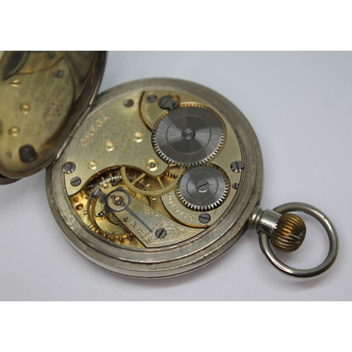 114 - An early 20th century Omega open faced pocket watch, the movement inscribed 'Omega' and numbered 401... 