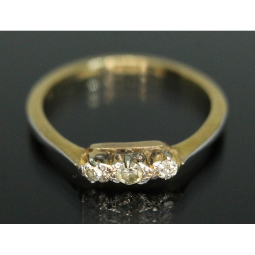 132 - A three stone diamond ring, marked '18ct' & 'PLAT', gross weight 1.96g, size L.