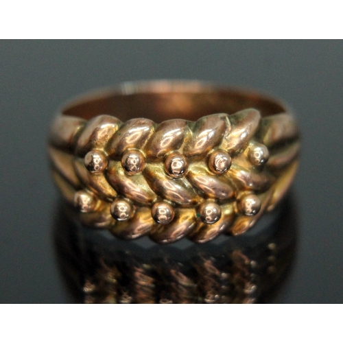 134 - A 9ct gold ring of faux plaited design, weight 2.22g, size Q/R.