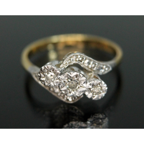 165 - An early 20th century three stone diamond ring, the band marked '18ctPLAT', gross weight 2.93g, size... 