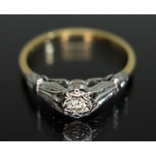 175 - An early 20th century diamond solitaire, the central stone weighing approx. 0.07 carats, band unmark... 