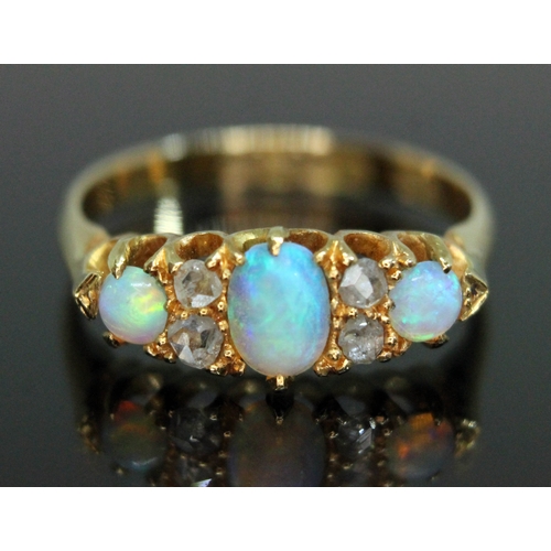 187 - A late Victorian opal and diamond ring, the cluster measuring approx. 17.21mm x 7.06mm, hallmarked 1... 