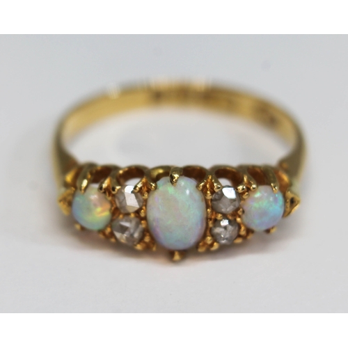 187 - A late Victorian opal and diamond ring, the cluster measuring approx. 17.21mm x 7.06mm, hallmarked 1... 