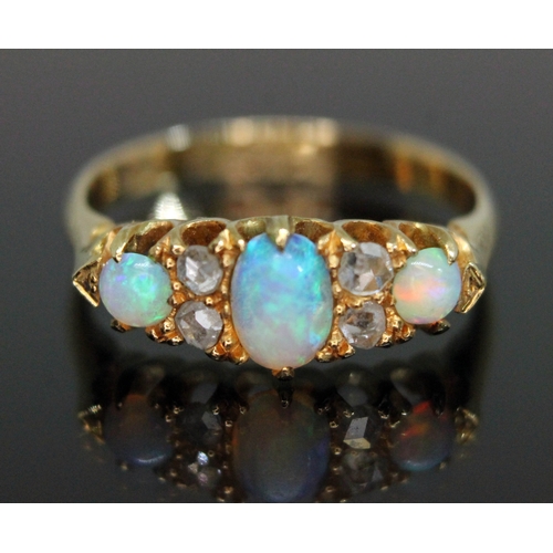 187 - A late Victorian opal and diamond ring, the cluster measuring approx. 17.21mm x 7.06mm, hallmarked 1... 