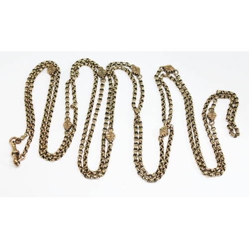 190 - An antique guard chain, the round links interspersed with engraved lozenge shapes, clasp and chain m... 