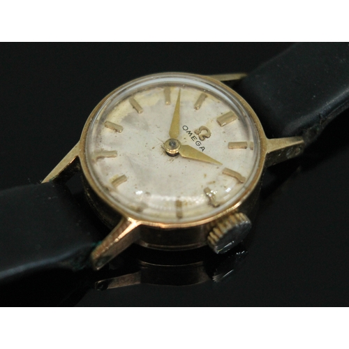 194 - A ladies 9ct gold Omega wristwatch, case diam. 16mm, approx. gross case weight 8g.