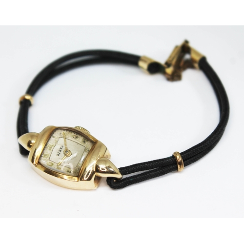 195 - A ladies Birk wristwatch, the case marked '14k', approx. gross case weight (including movement) 8g.