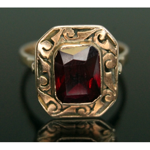 204 - A synthetic ruby ring, band unmarked, gross weight 3.41g, size N/O.