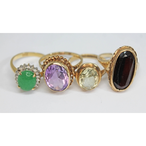 229 - Four assorted rings comprising a diamond and crackled green dyed quartz cabochon ring marked '18K' &... 