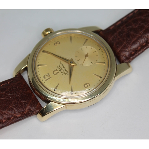 92 - A 1954 Omega Seamaster. ref. 14677088, cal. 491, 33mm gold plated case, signed champagne dial with d... 