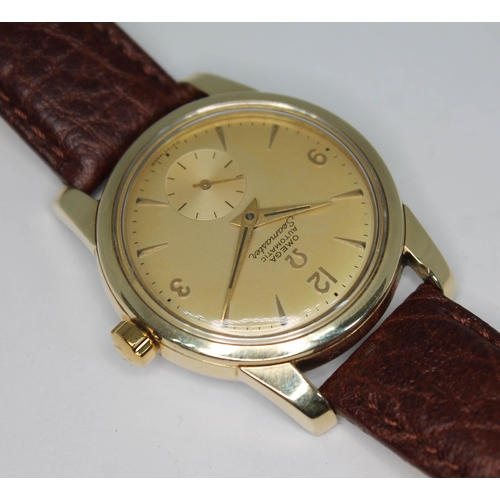 92 - A 1954 Omega Seamaster. ref. 14677088, cal. 491, 33mm gold plated case, signed champagne dial with d... 