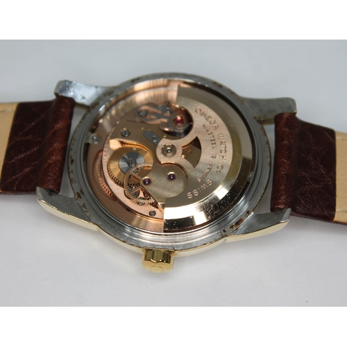 92 - A 1954 Omega Seamaster. ref. 14677088, cal. 491, 33mm gold plated case, signed champagne dial with d... 