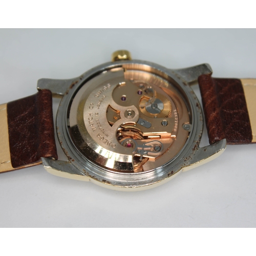 92 - A 1954 Omega Seamaster. ref. 14677088, cal. 491, 33mm gold plated case, signed champagne dial with d... 