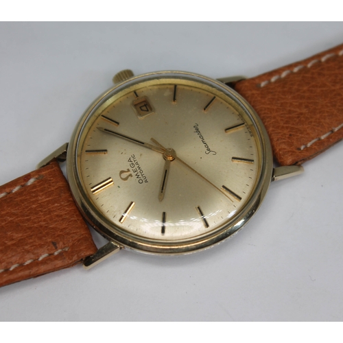 93 - An Omega Seamaster automatic wristwatch, circa 1960s, signed champagne dial with gold baton hour mar... 