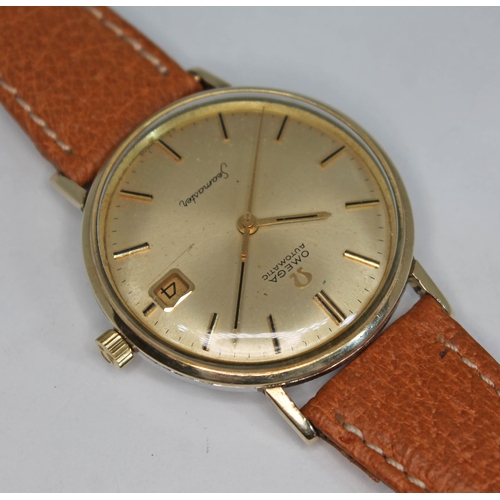 93 - An Omega Seamaster automatic wristwatch, circa 1960s, signed champagne dial with gold baton hour mar... 