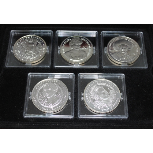 279 - A cased set of five commemorative silver proof coins, comprising three crowns, a two pounds and a $1... 