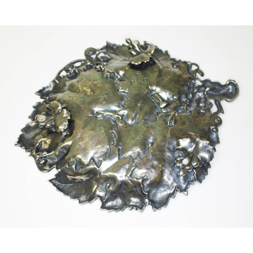 284 - A Victorian silver grape dish, formed as overlapping vine leaves with grape and vine handle, on thre... 