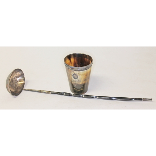 303 - A hallmarked silver ladle with twist horn handle and a horn beaker with hallmarked silver rim.