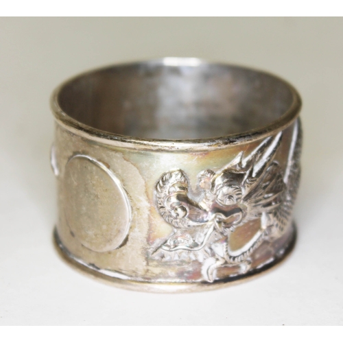 304 - A Chinese Canton silver serviette ring, the outside decorated with a dragon, marked 'SF', probably S... 