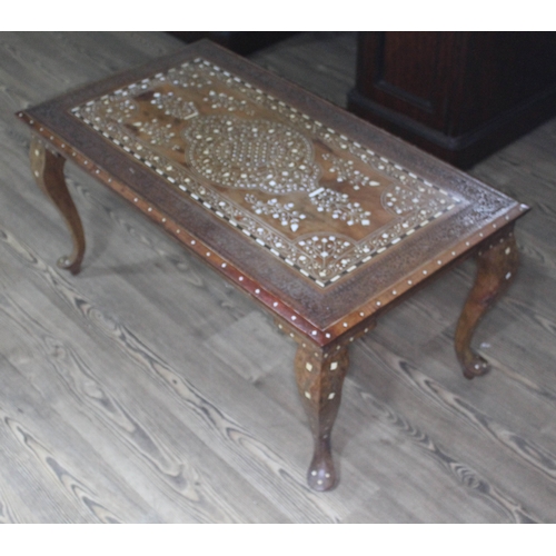 65 - An Indian ivory inlaid coffee table, length 92cm.