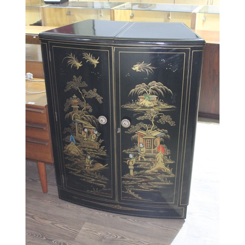 69 - A mid 20th century fold out bar decorated in chinoiserie, min. width 83cm, depth 43cm & height 103cm... 