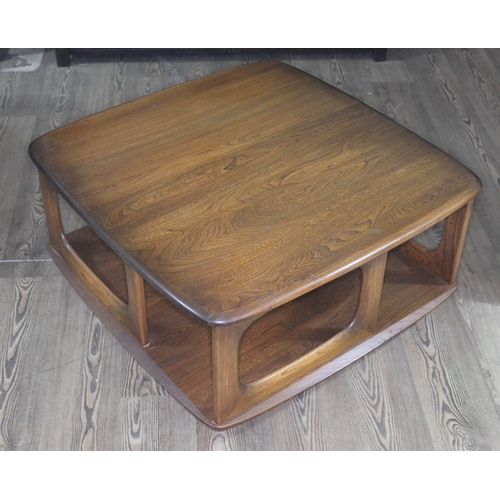 71 - An Ercol Golden Dawn Pandora coffee table.