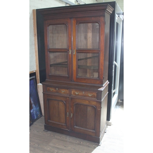 74 - A mahogany cabinet bookcase, width 103cm, depth 47cm & height 203cm.