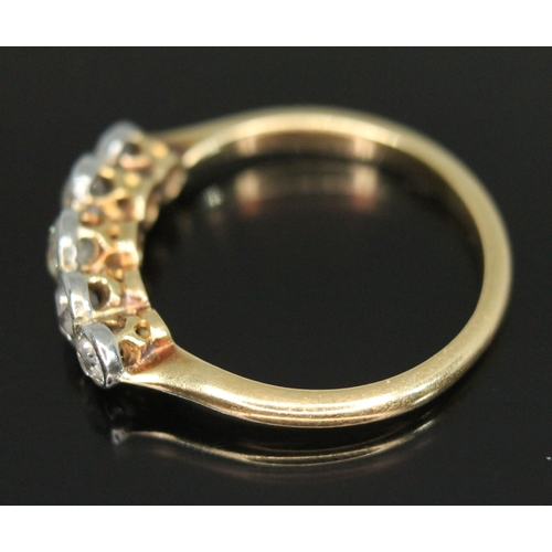 311 - A five stone diamond ring, the millegrain bezel set old European cut stones weighing approx. 0.07, 0... 