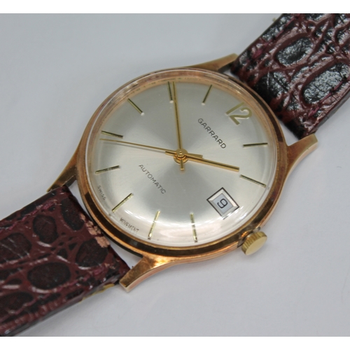 316 - A Garrard hallmarked 9ct gold automatic wristwatch, signed champagne dial with baton hour markers; d... 