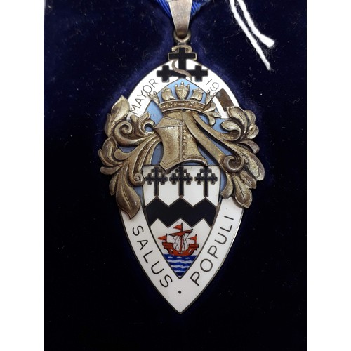 266 - A white metal and enamel mayoral medal, the hanging loop marked with the lion passant, the drop unma... 