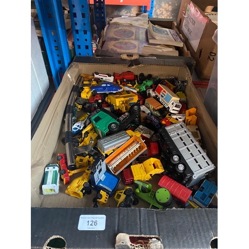 126 - A box of die-cast toys.