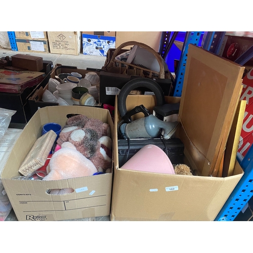 182 - A box of misc including pictures, handheld vac, radio, lamp, etc and a box of soft toys, ceramics an... 