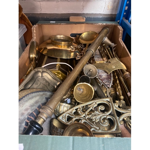 220 - A box of brassware including brass lamp.