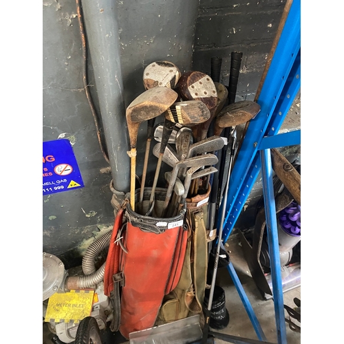 241 - 2 bags of vintage golf clubs and a bundle of clubs.